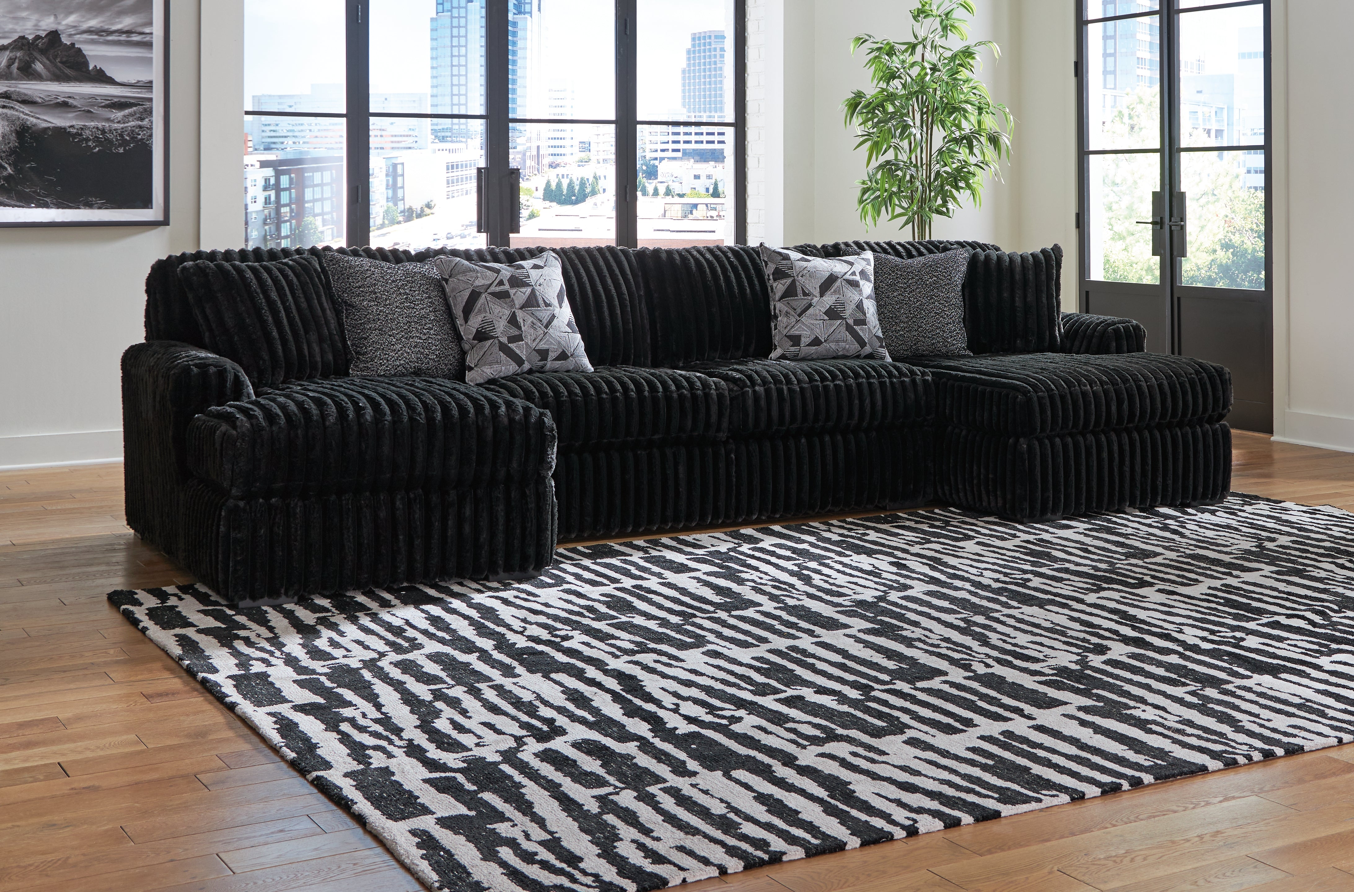 Family Deals Furniture - Ashley Furniture - Midnight-Madness Sectional - LAF 3-Piece Sectional with Chaise / Onyx - 98103S9