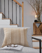 Family Deals Furniture - Ashley Furniture - Benbert Pillows - Pillow / Tan/White - A1000958P