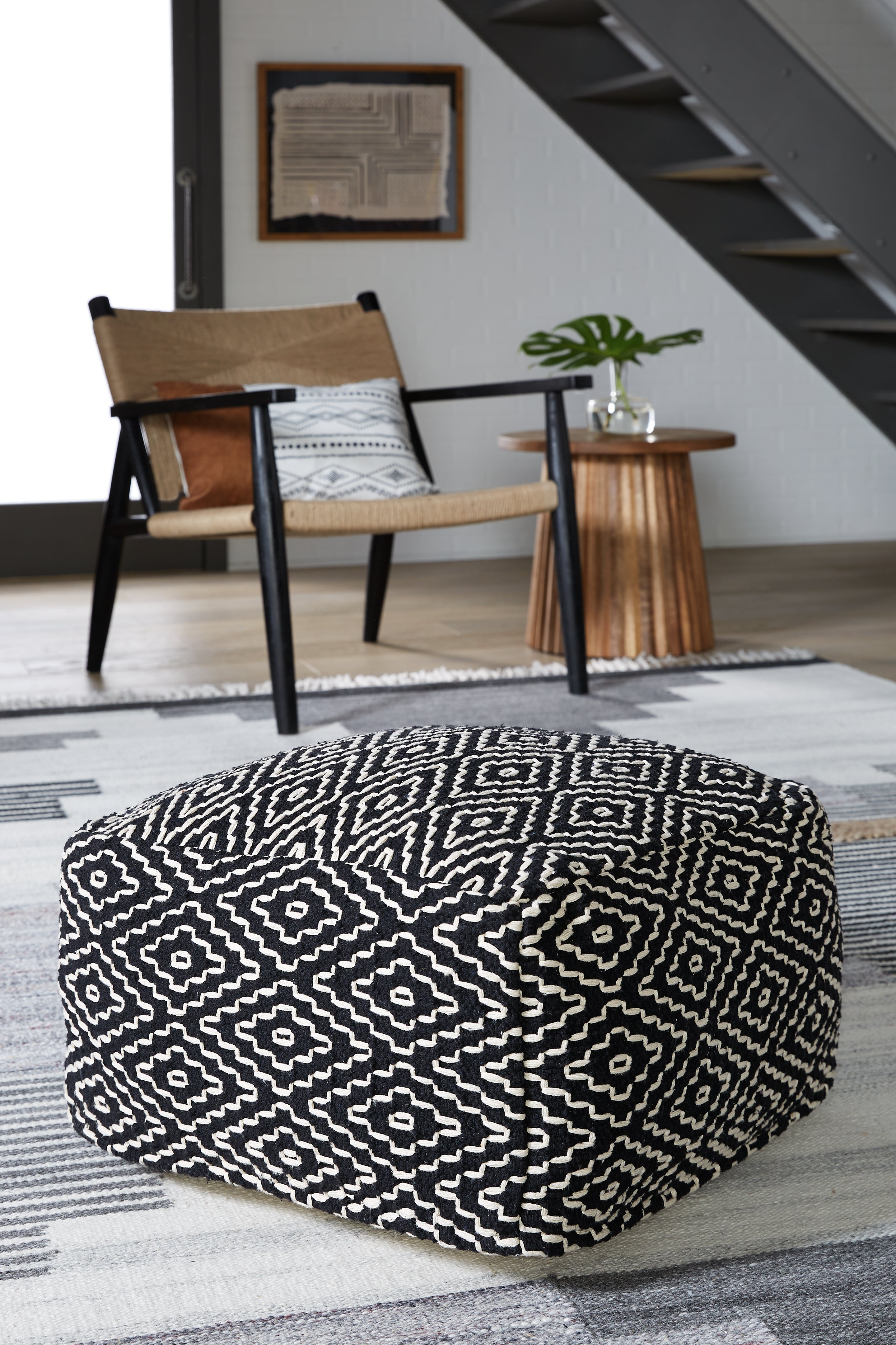 Family Deals Furniture - Ashley Furniture - Jasett Pouf - Pouf / Black/Ivory - A1001058