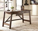 Family Deals Furniture - Ashley Furniture - Baldridge Office Desk - Home Office Large Leg Desk / Rustic Brown - H675-44