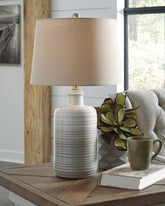 Family Deals Furniture - Ashley Furniture - Marnina Lighting - Ceramic Table Lamp (Set of 2) / Taupe - L121854