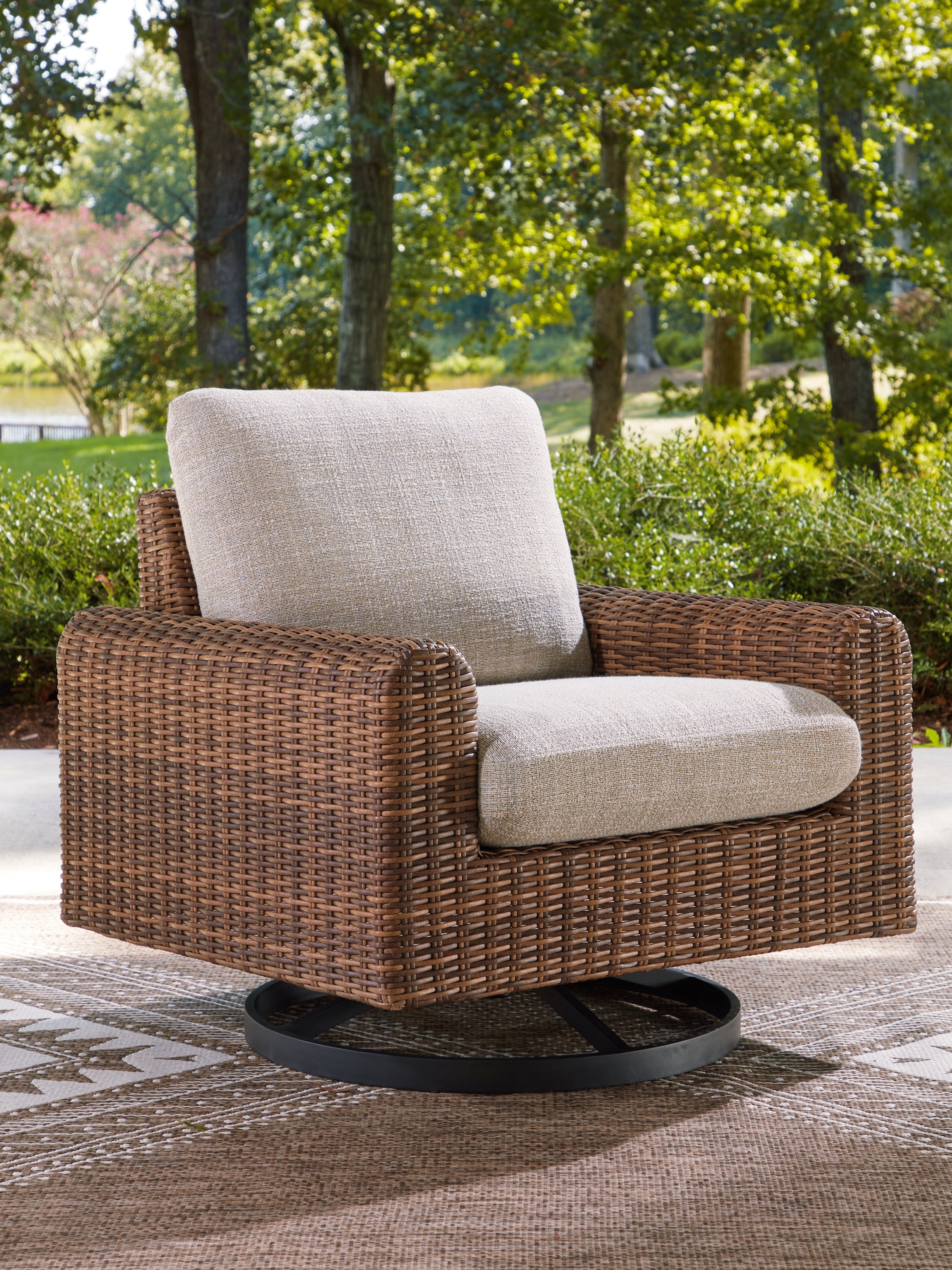 Family Deals Furniture - Ashley Furniture - Dolan Creek Outdoor - Swivel Lounge w/ Cushion / Gray/Brown - PCP610-821