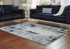 Family Deals Furniture - Ashley Furniture - Leonelle Rug - 7'10" x 10' Rug / White/Blue/Gray - R404871