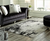 Family Deals Furniture - Ashley Furniture - Zekeman Rug - 7'10" x 10' Rug / Black/Cream/Gray - R404921