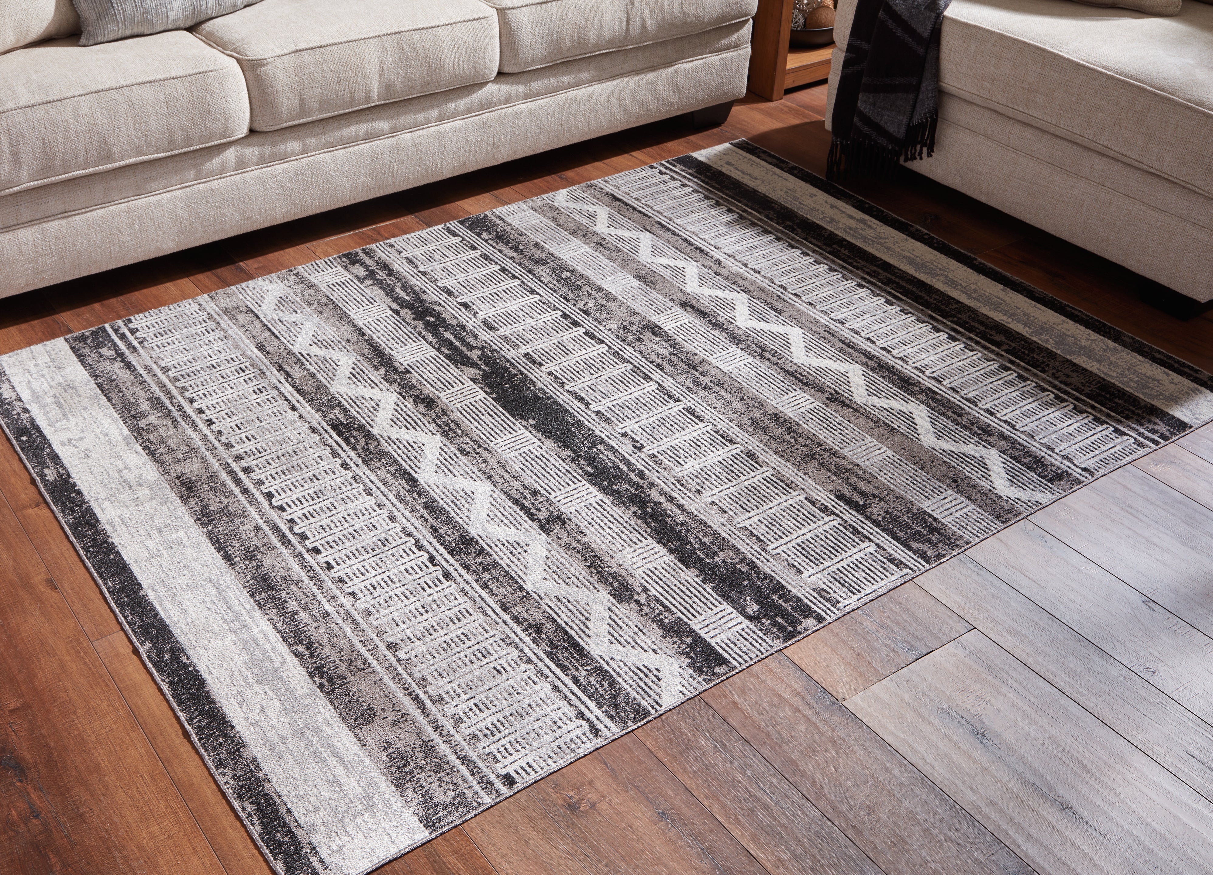 Family Deals Furniture - Ashley Furniture - Henchester Rug - 5' x 7' Washable Rug / Multi - R405992