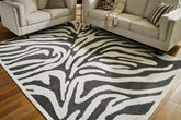 Family Deals Furniture - Ashley Furniture - Thomwith Rug - 8' x 10'2" Washable Rug / Black/Ivory - R406291