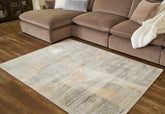 Family Deals Furniture - Ashley Furniture - Truward Rug - 5' x 7' Rug / Linen/Gray/Caramel - R406472