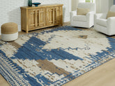 Family Deals Furniture - Ashley Furniture - Varnler Rug - 5' x 7' Rug / Blue/Brown/Tan - R407132