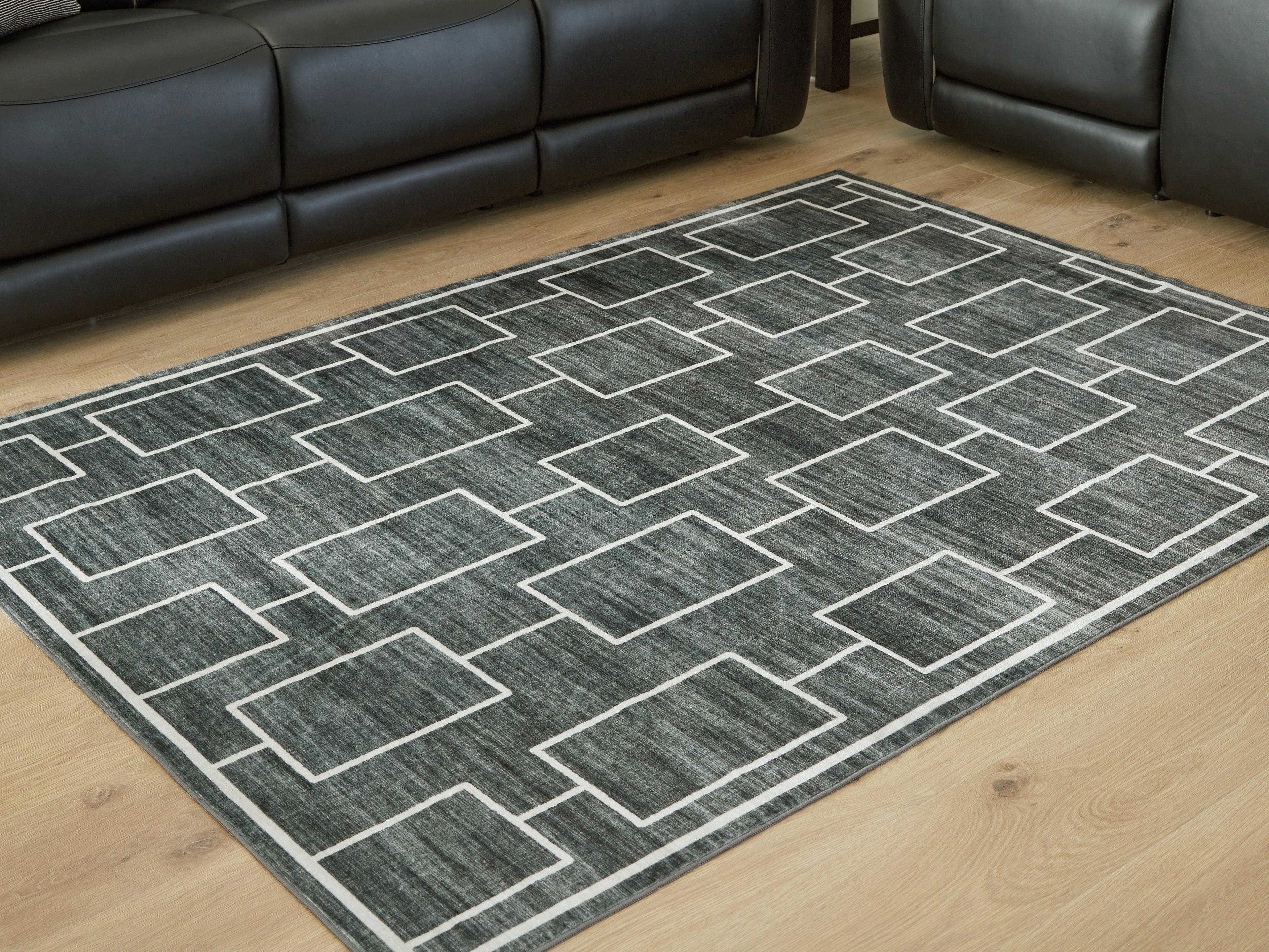 Family Deals Furniture - Ashley Furniture - Elderland Rug - Washable 5' x 7' Area Rug / Black/Gray - R407402