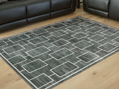 Family Deals Furniture - Ashley Furniture - Elderland Rug - Washable 5' x 7' Area Rug / Black/Gray - R407402