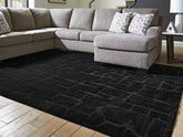 Family Deals Furniture - Ashley Furniture - Gibbswell Rug - Washable 5' x 7' Area Rug / Black - R407462