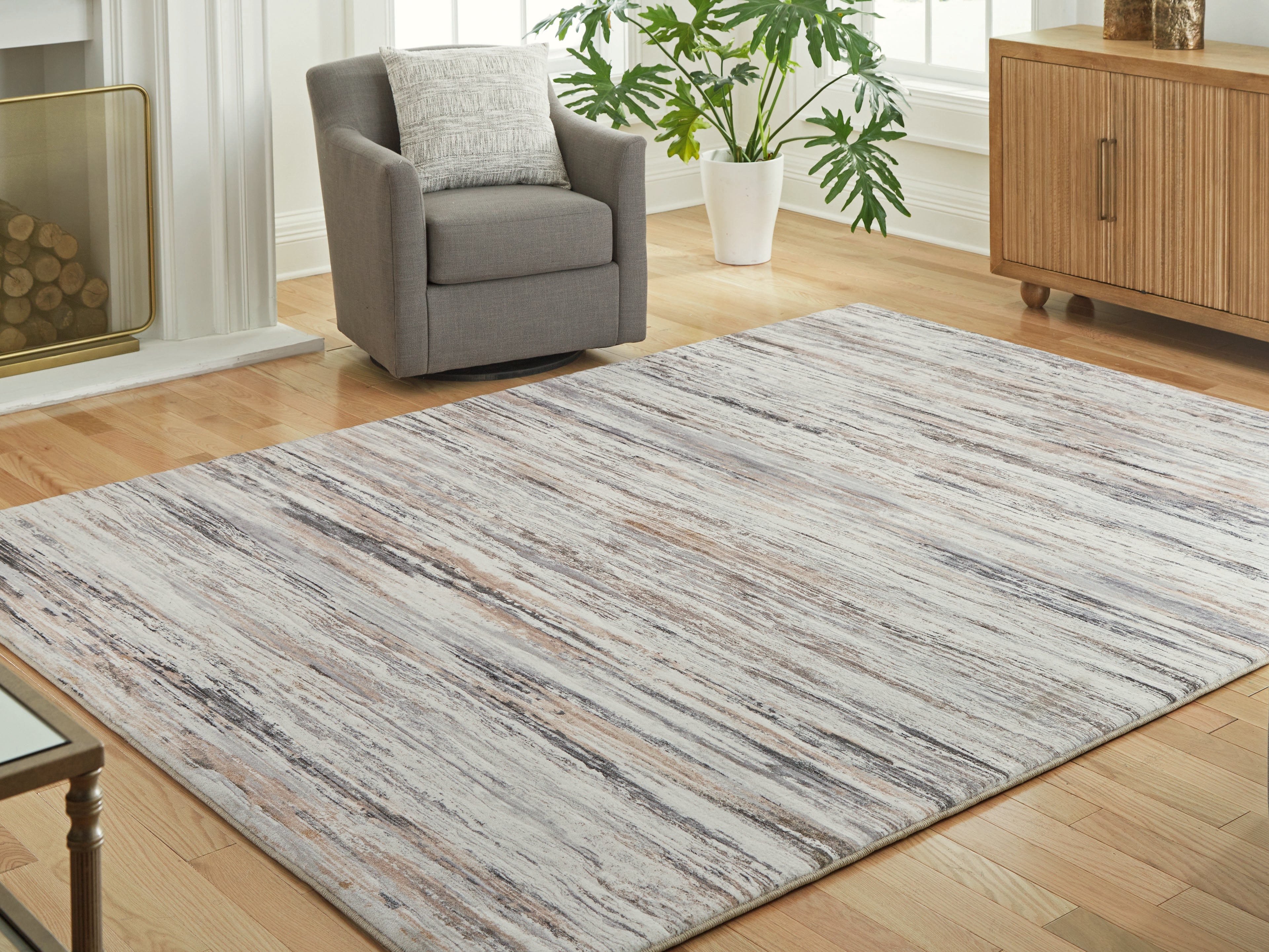 Family Deals Furniture - Ashley Furniture - Nace Rug - 7'6" x 9'6" Area Rug / Gray/Brown/White - R407471