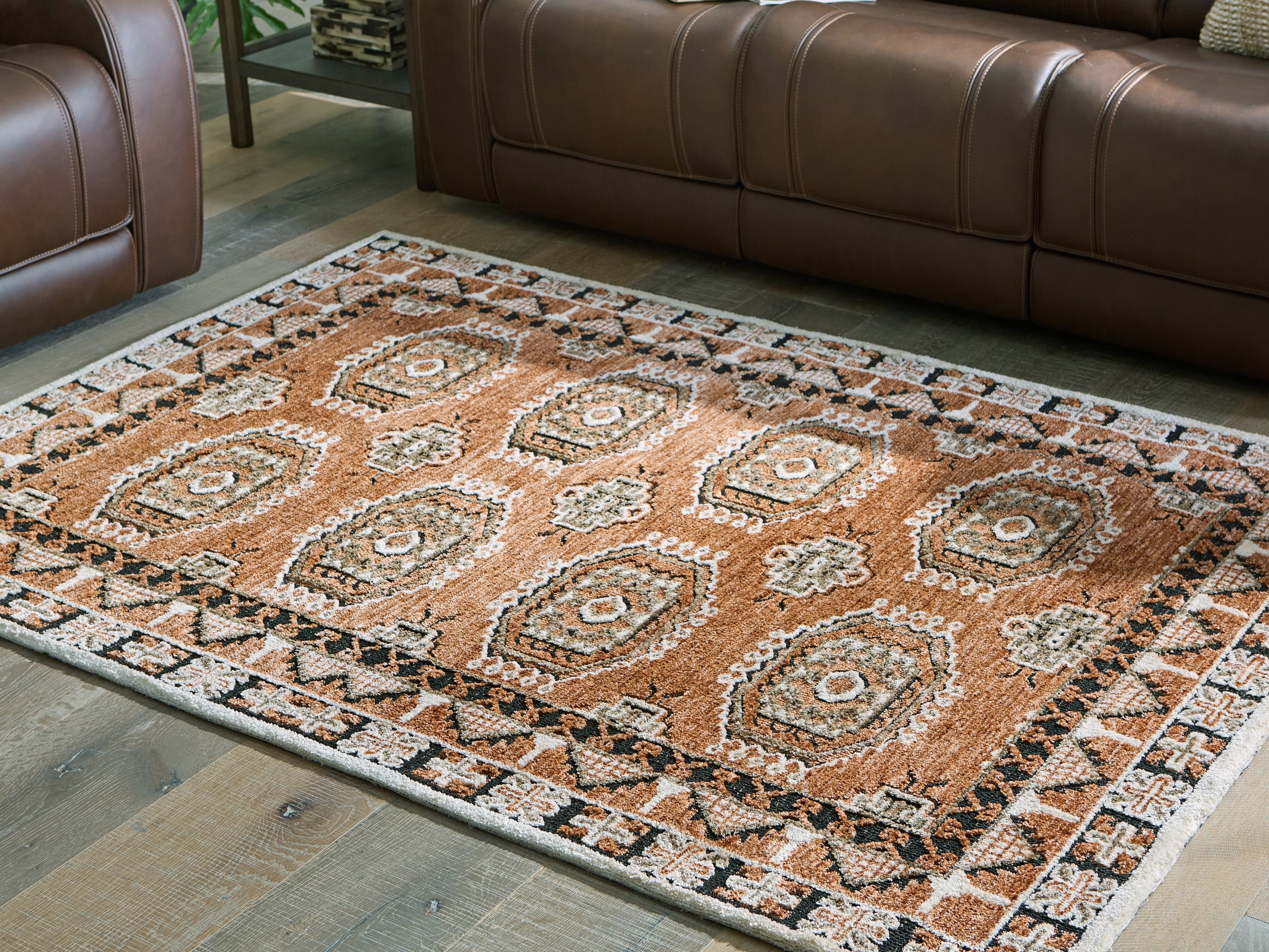 Family Deals Furniture - Ashley Furniture - Qaabiz Rug - 7'8" x 10' Area Rug / Sienna/Ivory/Black - R407521