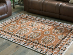 Family Deals Furniture - Ashley Furniture - Qaabiz Rug - 7'8" x 10' Area Rug / Sienna/Ivory/Black - R407521