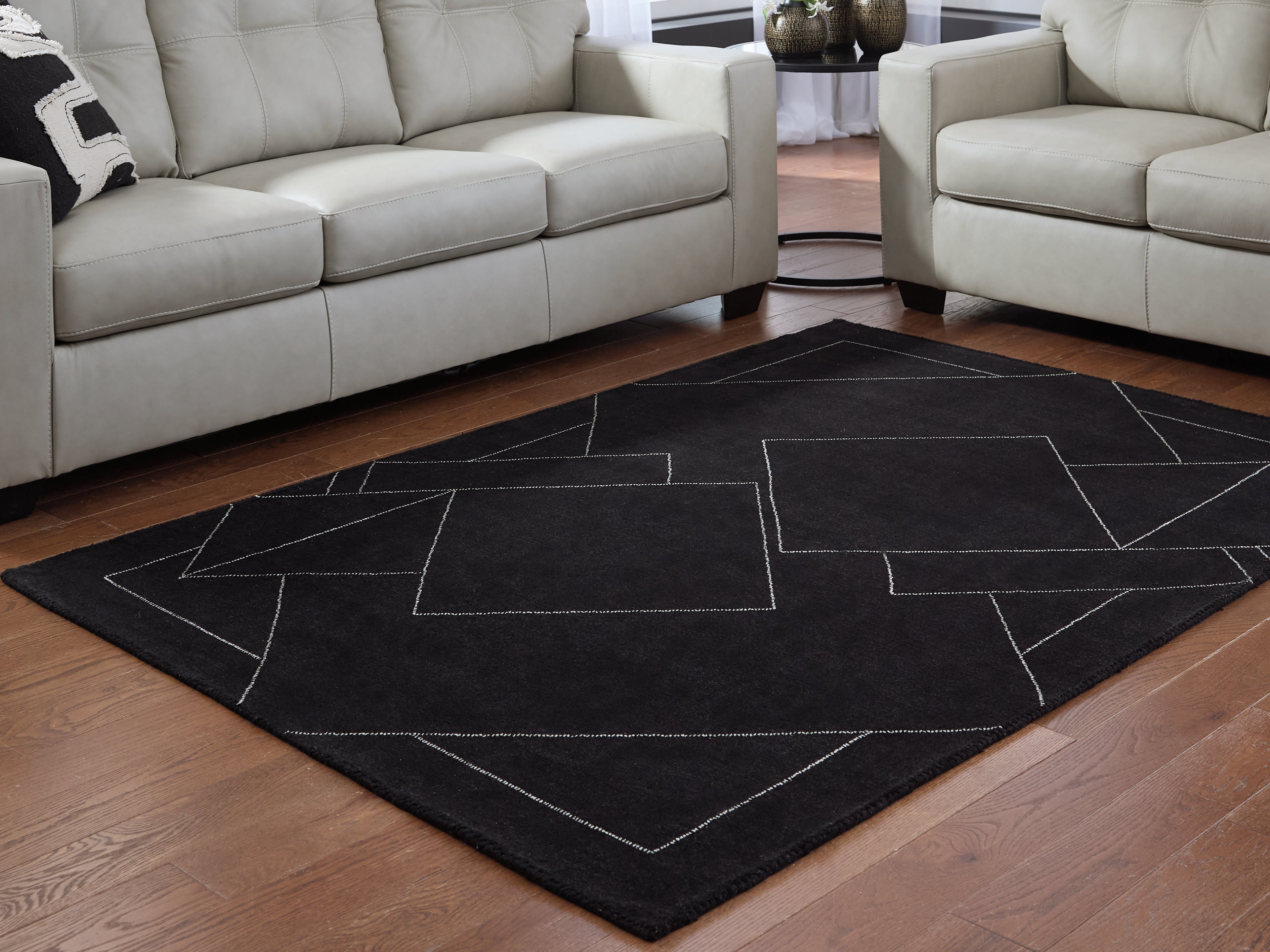 Family Deals Furniture - Ashley Furniture - Marav Rug - 5' x 7' Area Rug / Black/White - R407532