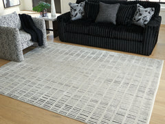 Family Deals Furniture - Ashley Furniture - Turinwith Rug - 5'3" x 7' Area Rug / Ivory/Black - R407552