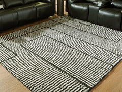 Family Deals Furniture - Ashley Furniture - Kurtmen Rug - 7'10" x 9'10" Area Rug / Black/Ivory - R407591