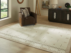 Family Deals Furniture - Ashley Furniture - Dot Rug - 5' x 7' Area Rug / Cream/Brown/Taupe - R407652