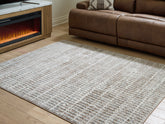 Family Deals Furniture - Ashley Furniture - Fuadwick Rug - 7'10" x 10' Area Rug / Multi - R407691