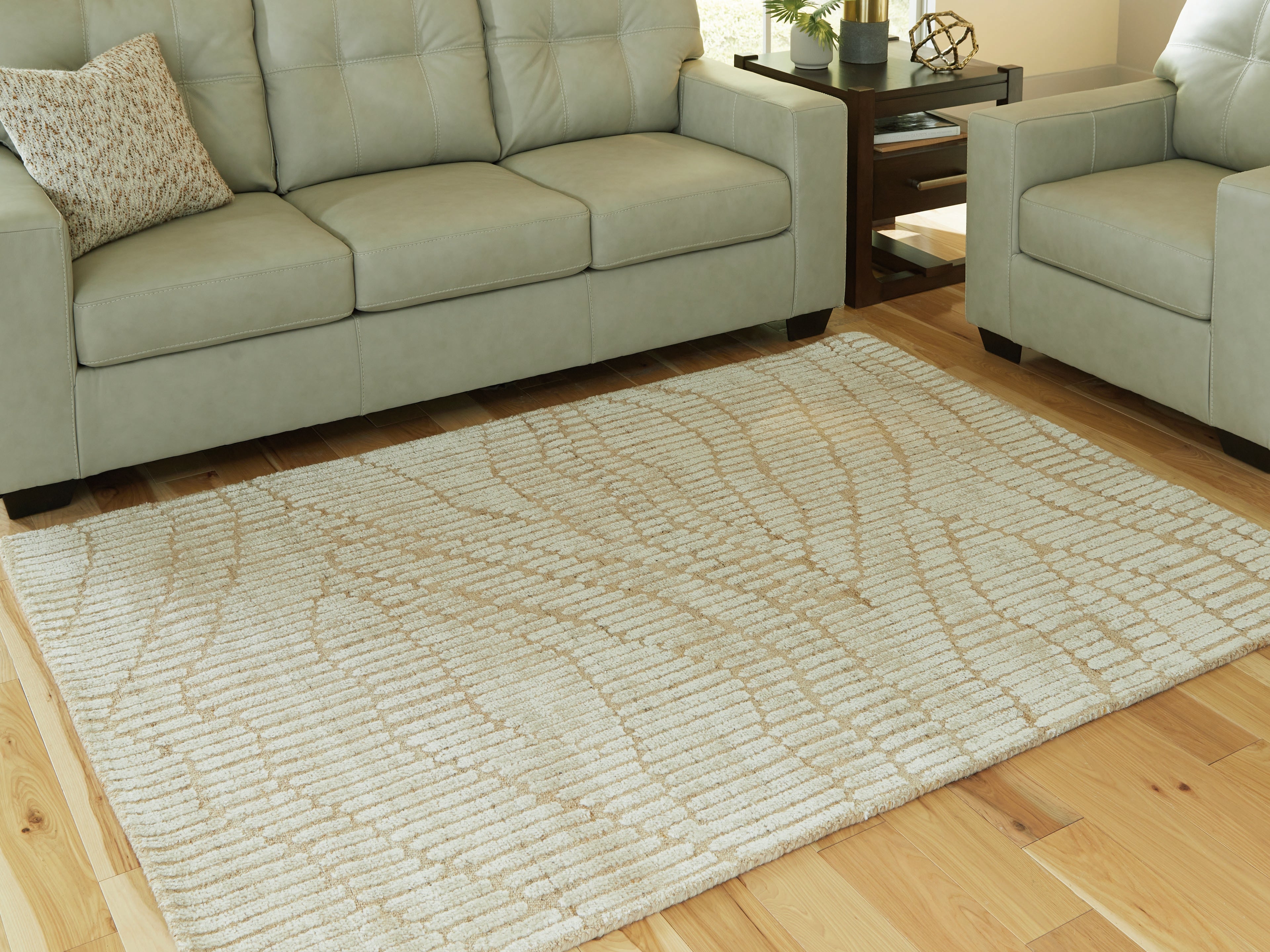 Family Deals Furniture - Ashley Furniture - Jaseena Rug - 5' x 7' Area Rug / Beige/Tan - R407722