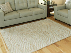 Family Deals Furniture - Ashley Furniture - Jaseena Rug - 5' x 7' Area Rug / Beige/Tan - R407722