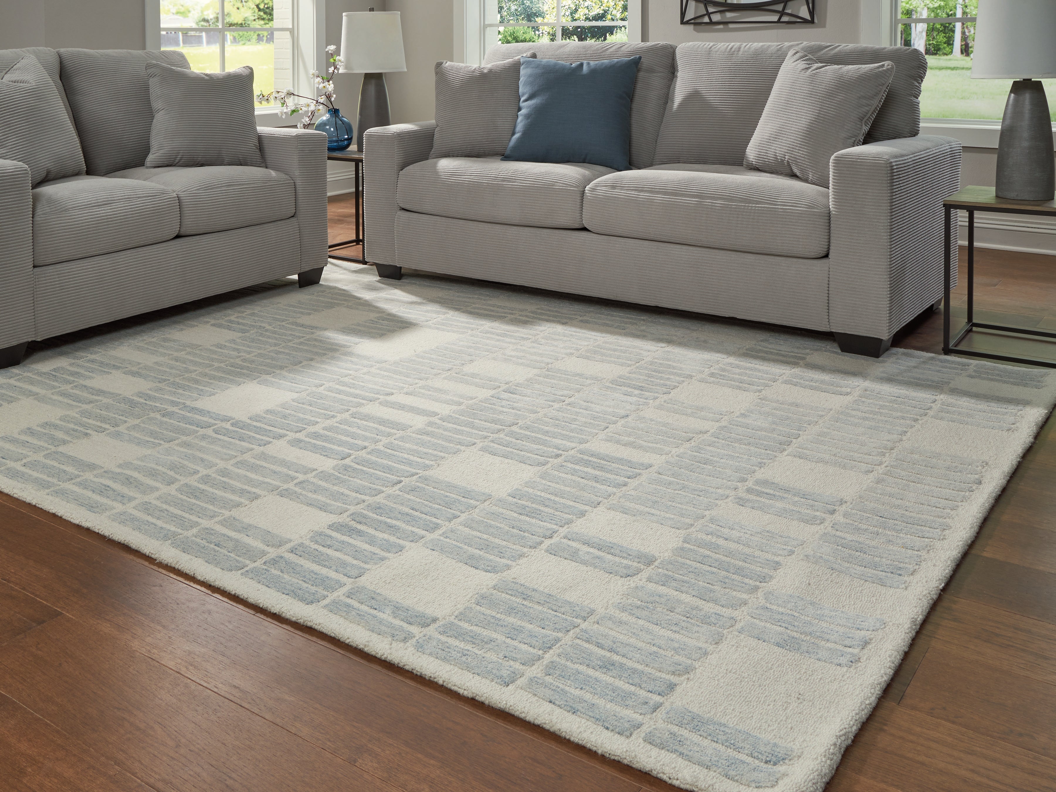 Family Deals Furniture - Ashley Furniture - Dylanton Rug - 5' x 7' Area Rug / Ivory/Blue - R407812