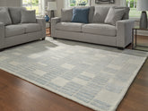 Family Deals Furniture - Ashley Furniture - Dylanton Rug - 5' x 7' Area Rug / Ivory/Blue - R407812