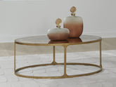 Family Deals Furniture - Ashley Furniture - Korajane Coffee Table - Oval Cocktail Table / Antique Gold - T399-0