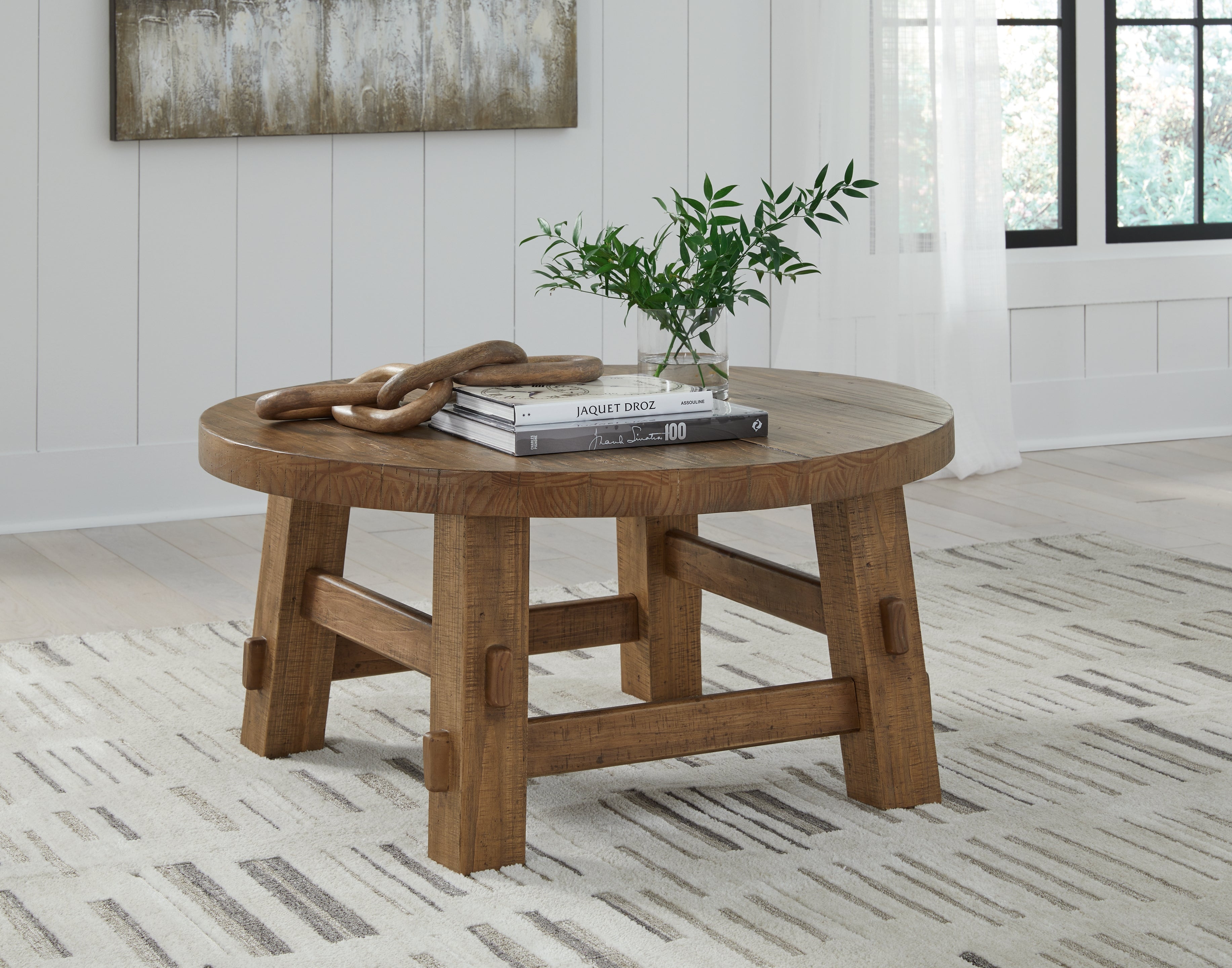 Family Deals Furniture - Ashley Furniture - Mackifeld Coffee Table - Round Cocktail Table / Warm Brown - T724-8