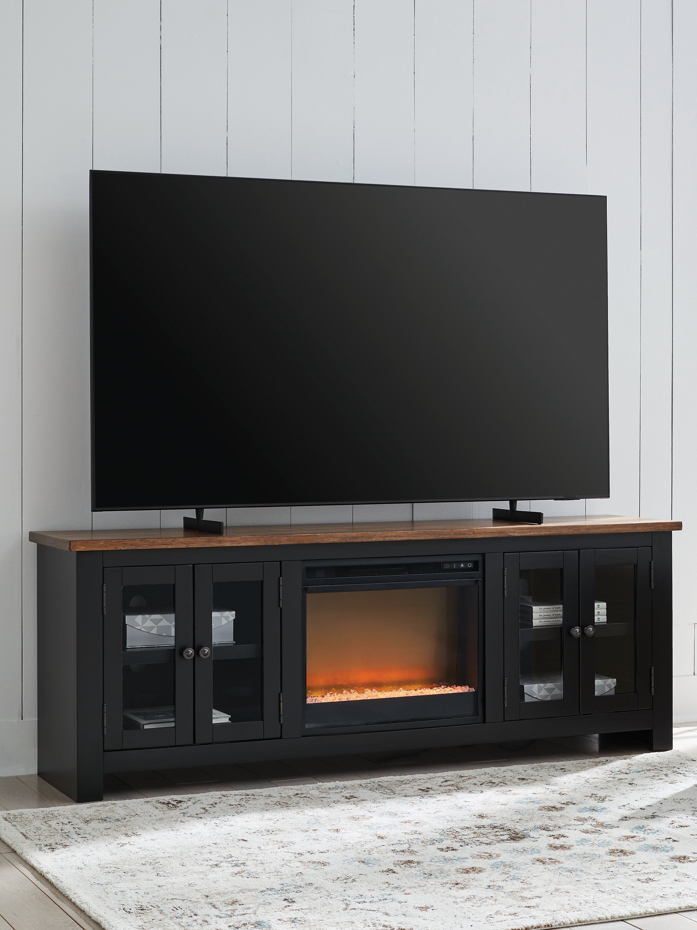 Family Deals Furniture - Ashley Furniture - Wildenauer 76" TV Stand with Electric Fireplace - 76" TV Stand with Electric Fireplace / Brown/Black - W664W2
