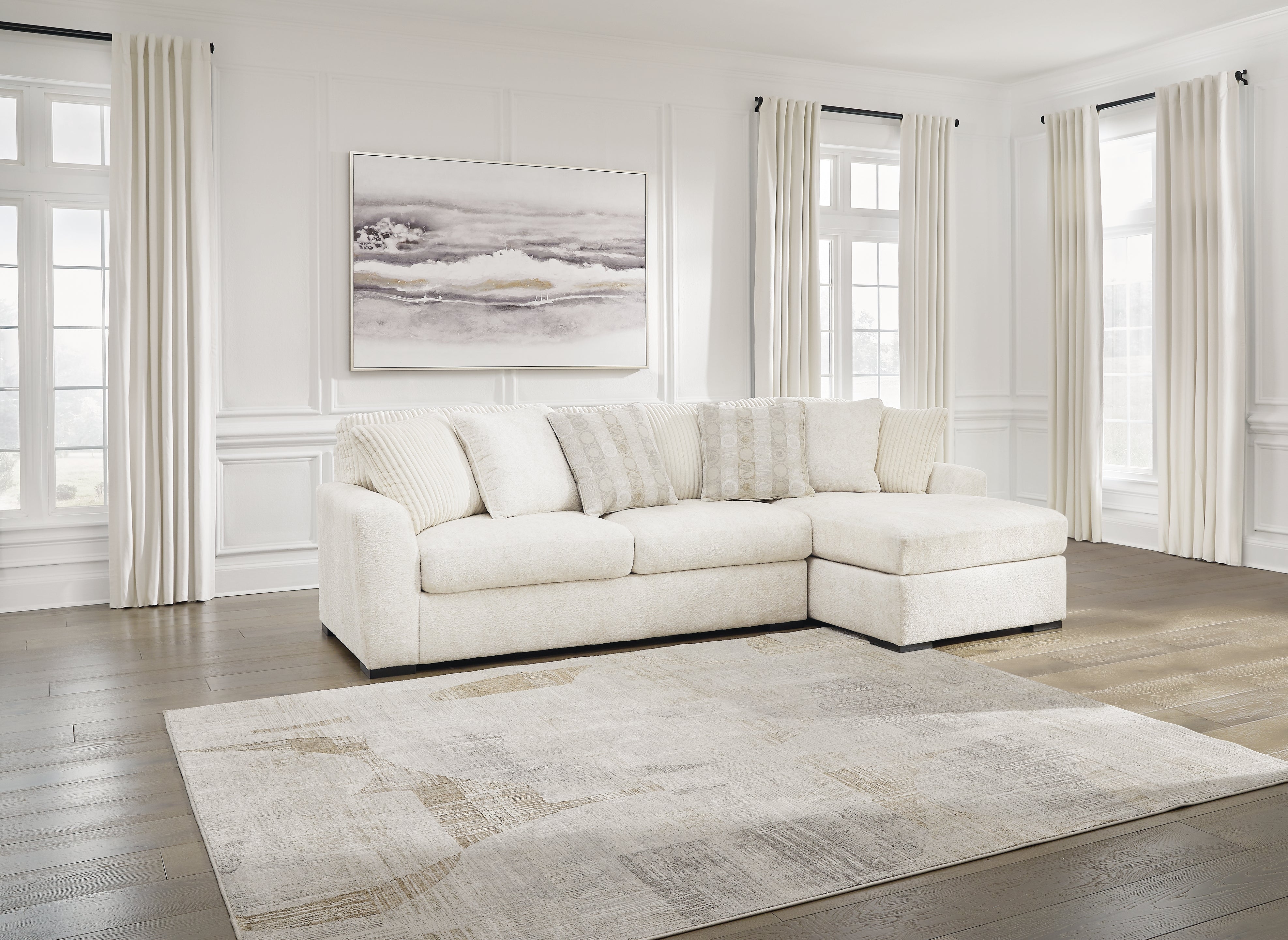 Family Deals Furniture - Ashley Furniture - Chessington Sectional - LAF 2-Piece Sectional with Chaise / Ivory - 61904S2