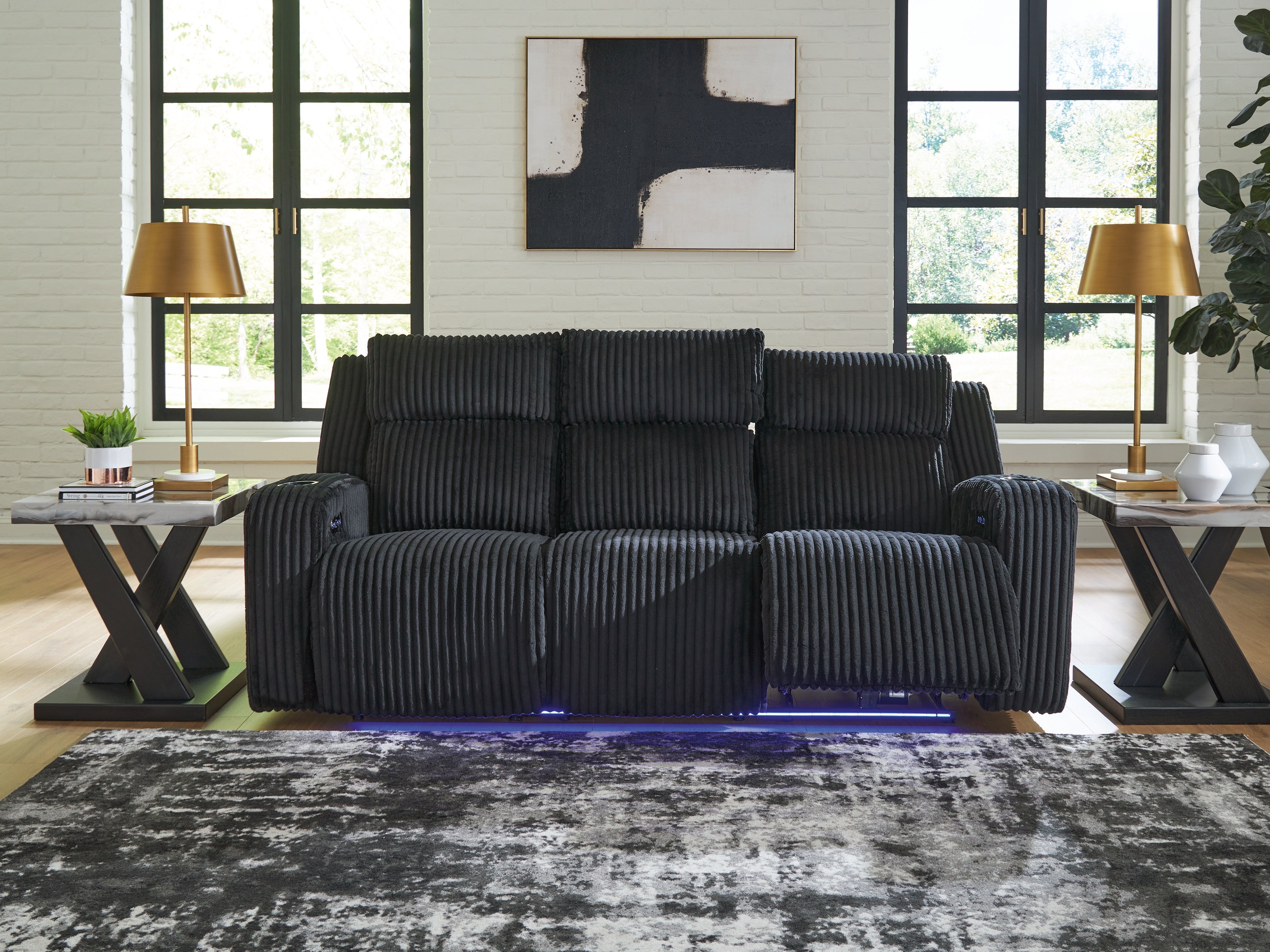 Family Deals Furniture - Ashley Furniture - Forest Lake Living Room - PWR REC Sofa with ADJ Headrest / Black - PC6420215