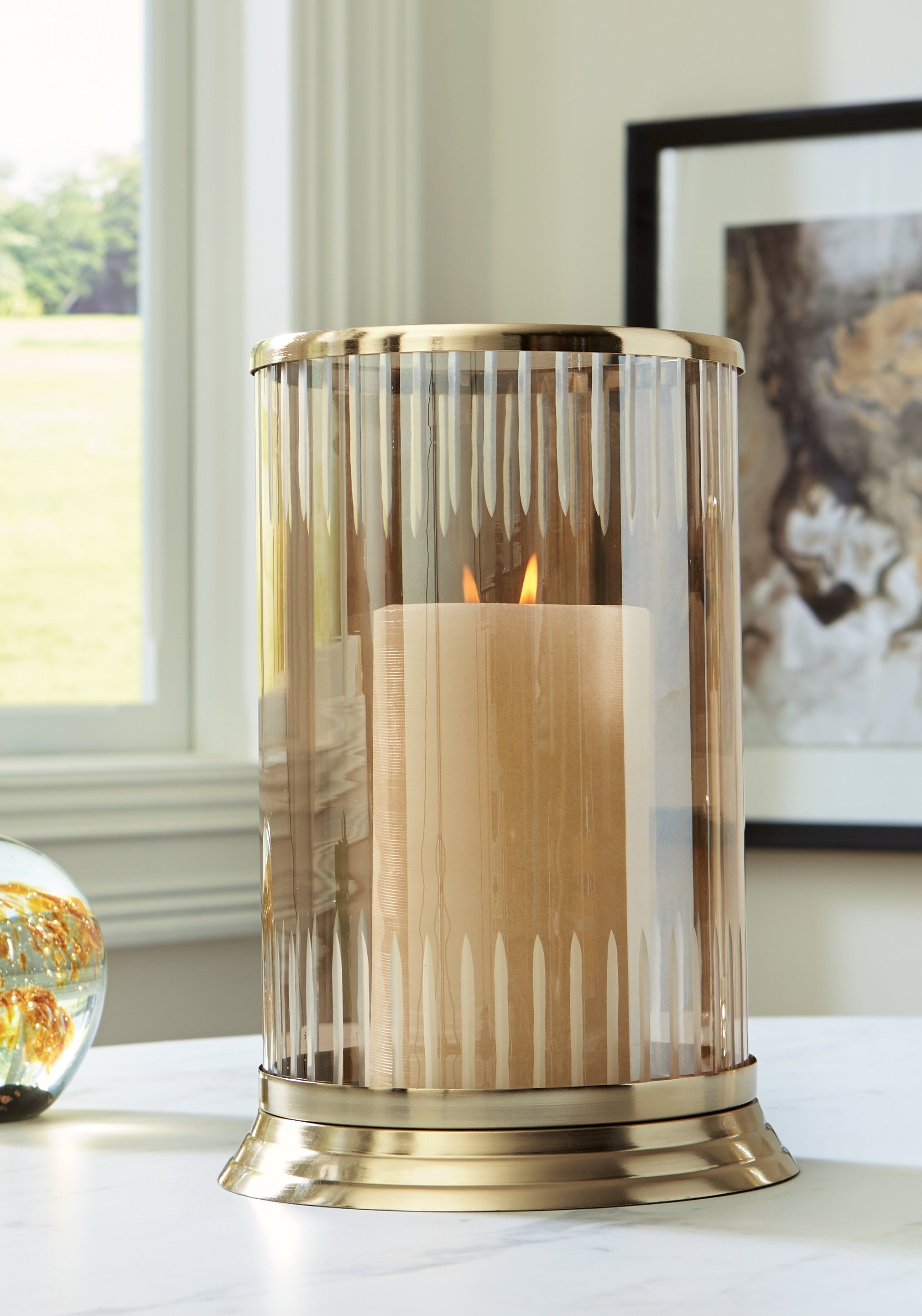 Family Deals Furniture - Ashley Furniture - Aavinson Candle Holder - Candle Holder / Amber/Gold Finish - A2000688