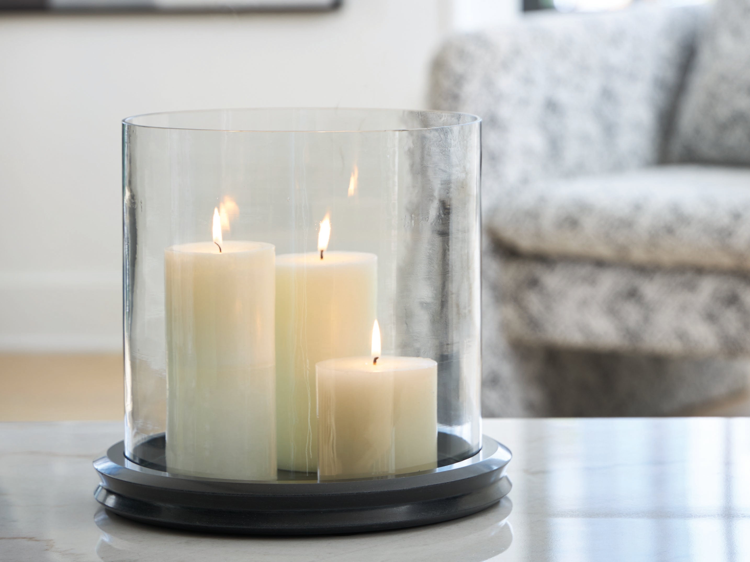 Family Deals Furniture - Ashley Furniture - Saskia Candle Holder - Candle Holder / Clear/Black - A2000846
