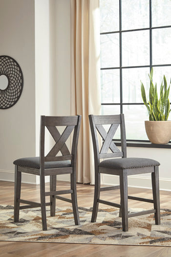 Family Deals Furniture - Ashley Furniture - Caitbrook Dining Room - Counter Height Upholstered Bar Stool (Set of 2) / Gray - D388-124X2