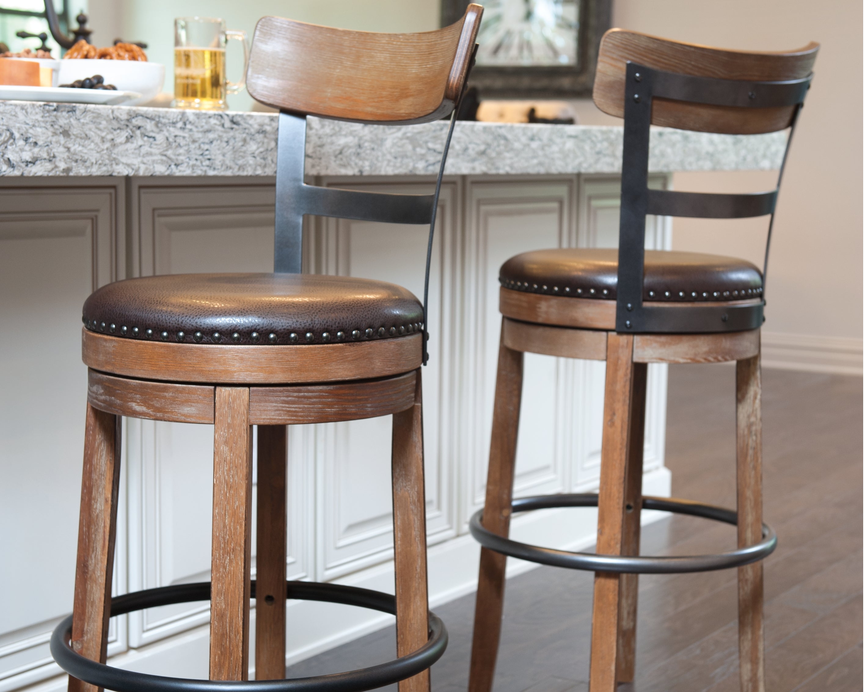 Family Deals Furniture - Ashley Furniture - Pinnadel Dining Room - Bar Height Bar Stool (Set of 2) / Grayish Brown - D542-130X2