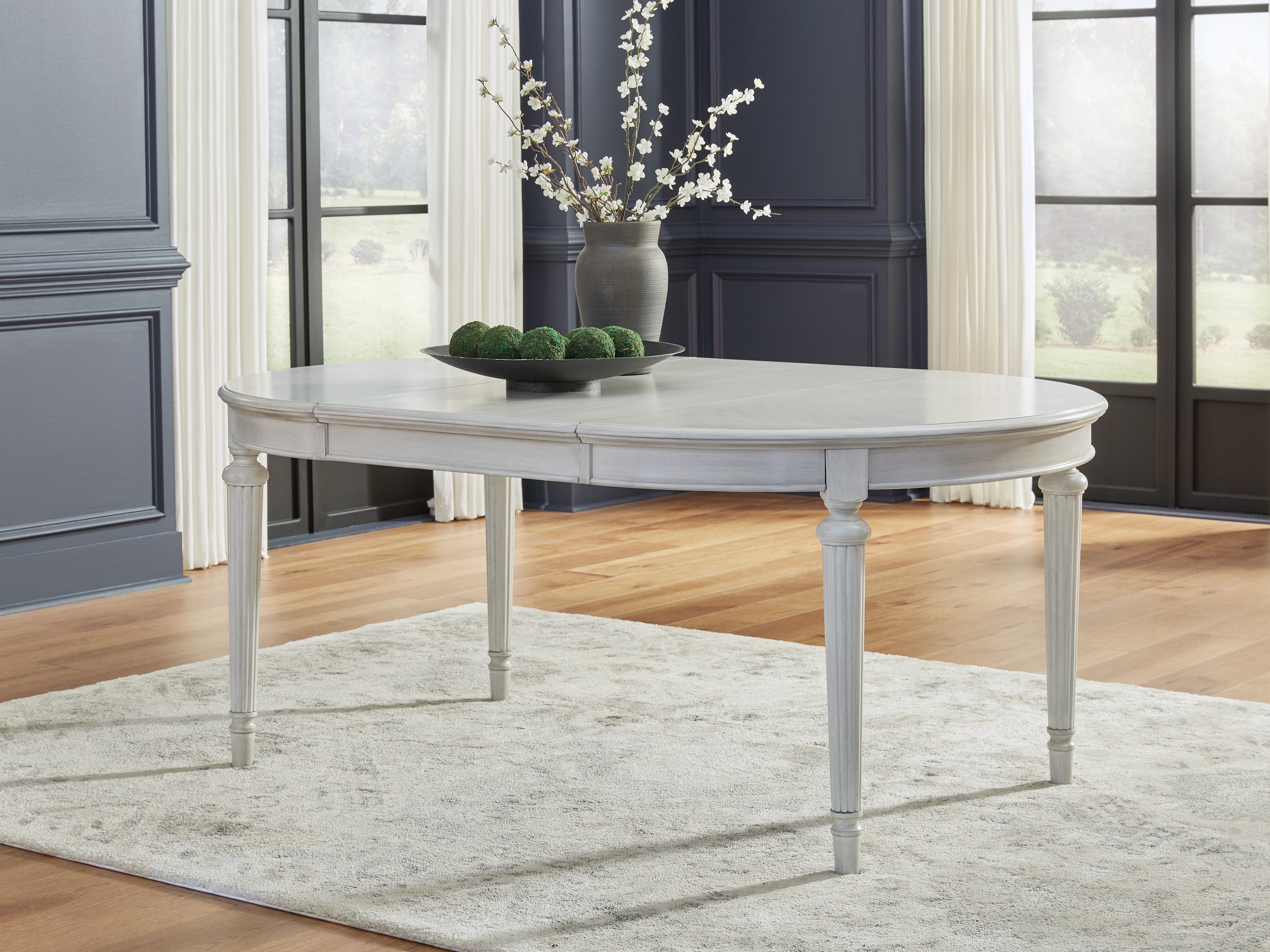 Family Deals Furniture - Ashley Furniture - Montelaine Dining Room - Oval Dining Room EXT Table / Antique White - D795-35