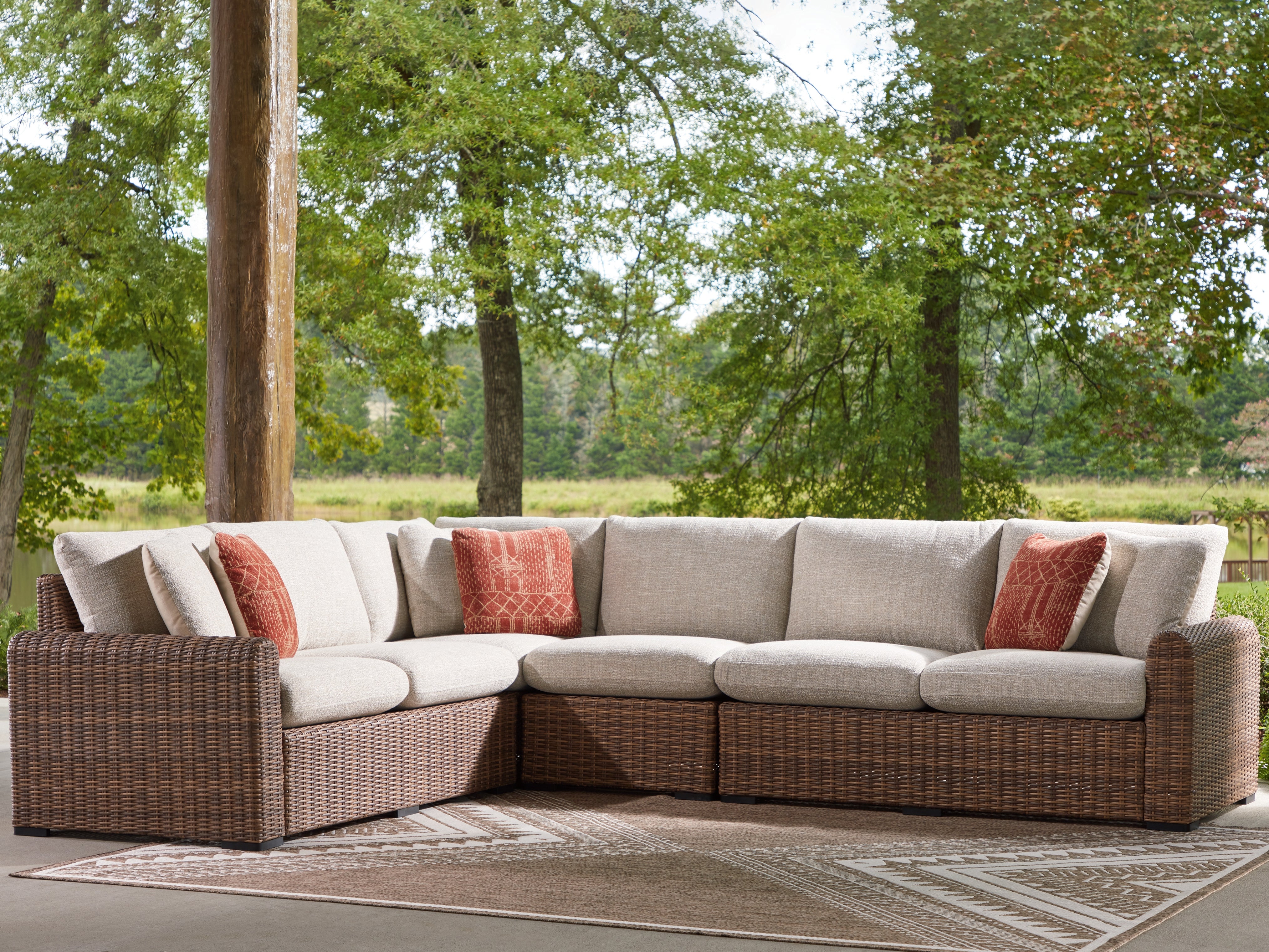 Family Deals Furniture - Ashley Furniture - Dolan Creek Outdoor - 4-Piece Outdoor Sectional / Beige/Brown - PCP610P2