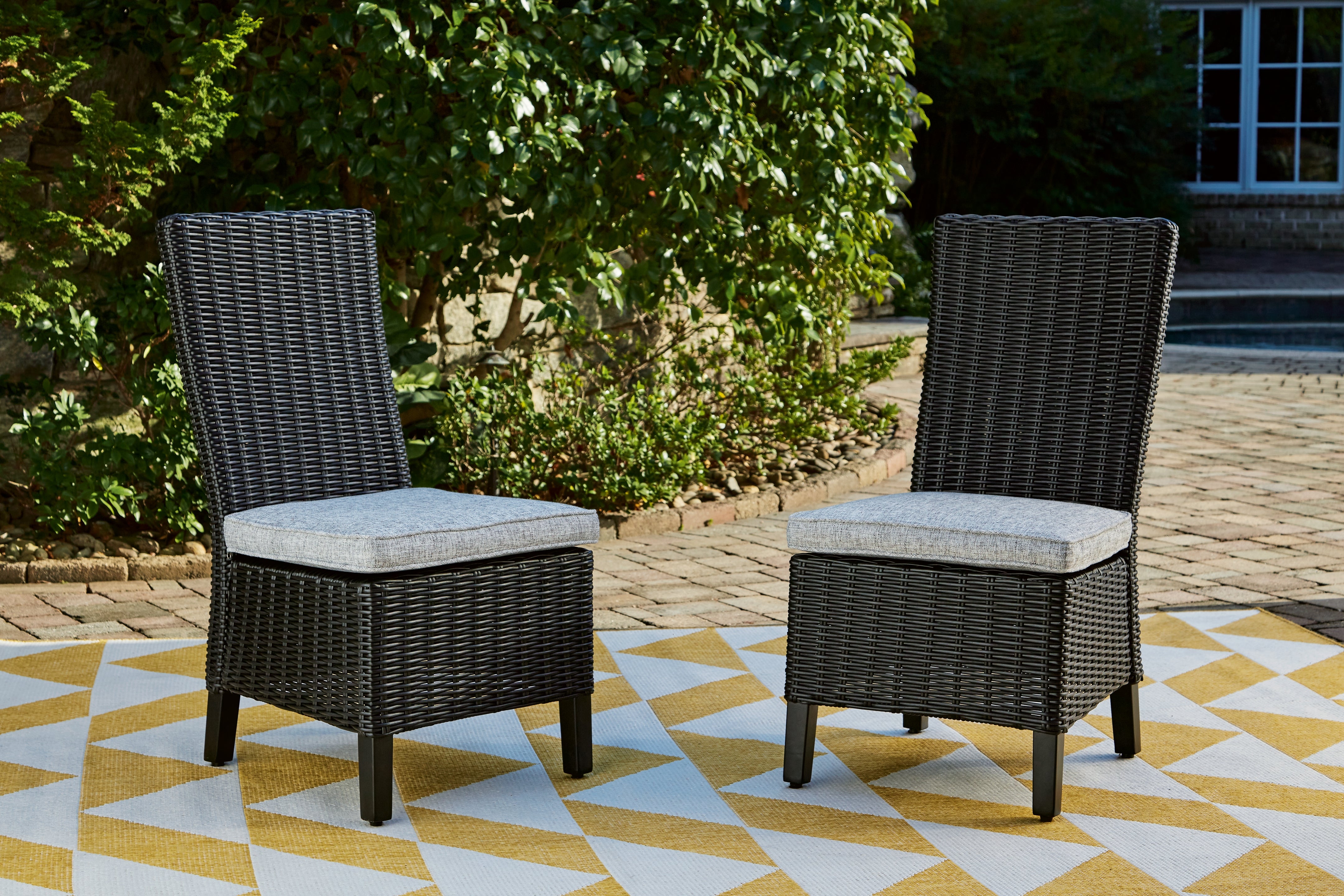 Family Deals Furniture - Ashley Furniture - Beachcroft Outdoor - Side Chair with Cushion (Set of 2) / Black/Light Gray - P792-601