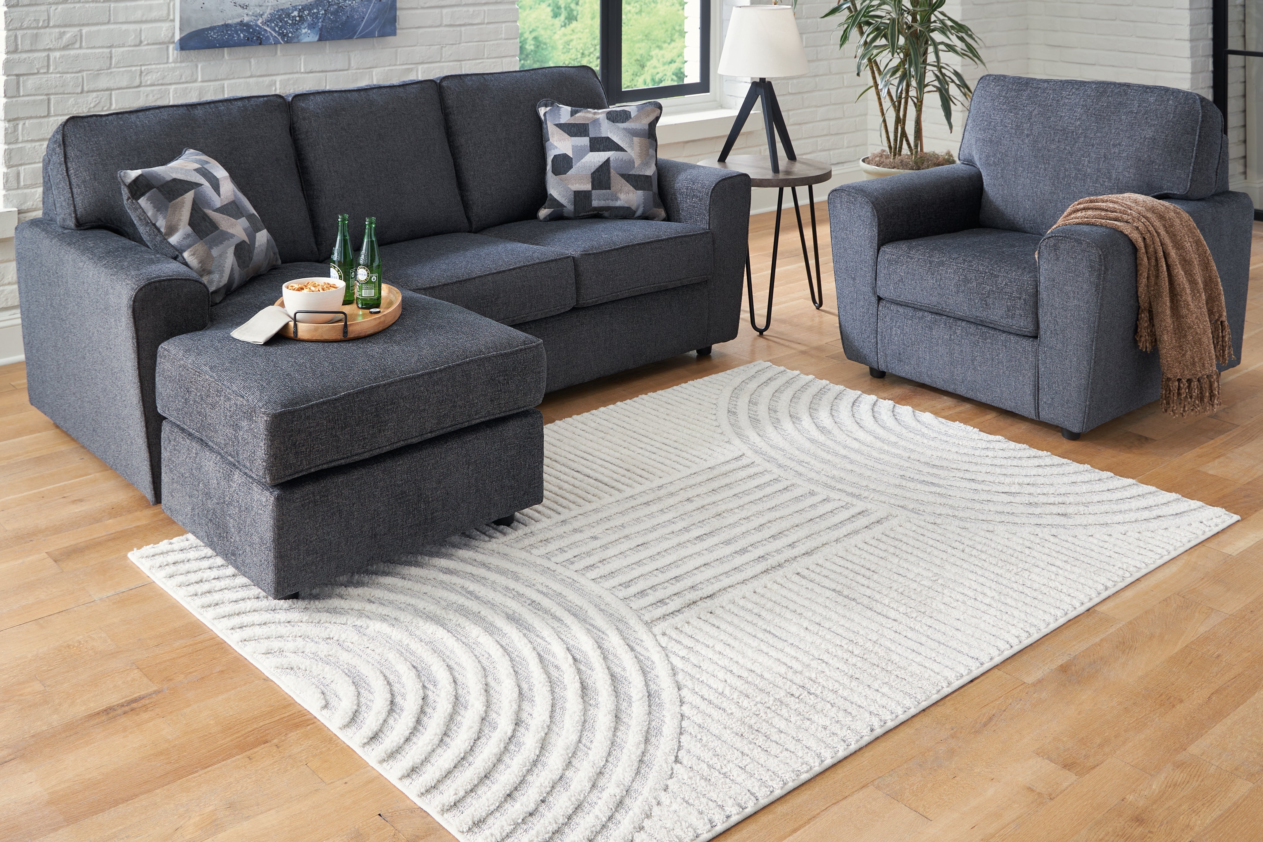 Family Deals Furniture - Ashley Furniture - Lambworth Rug - 7'10" x 10' Rug / Gray/Cream - R405341