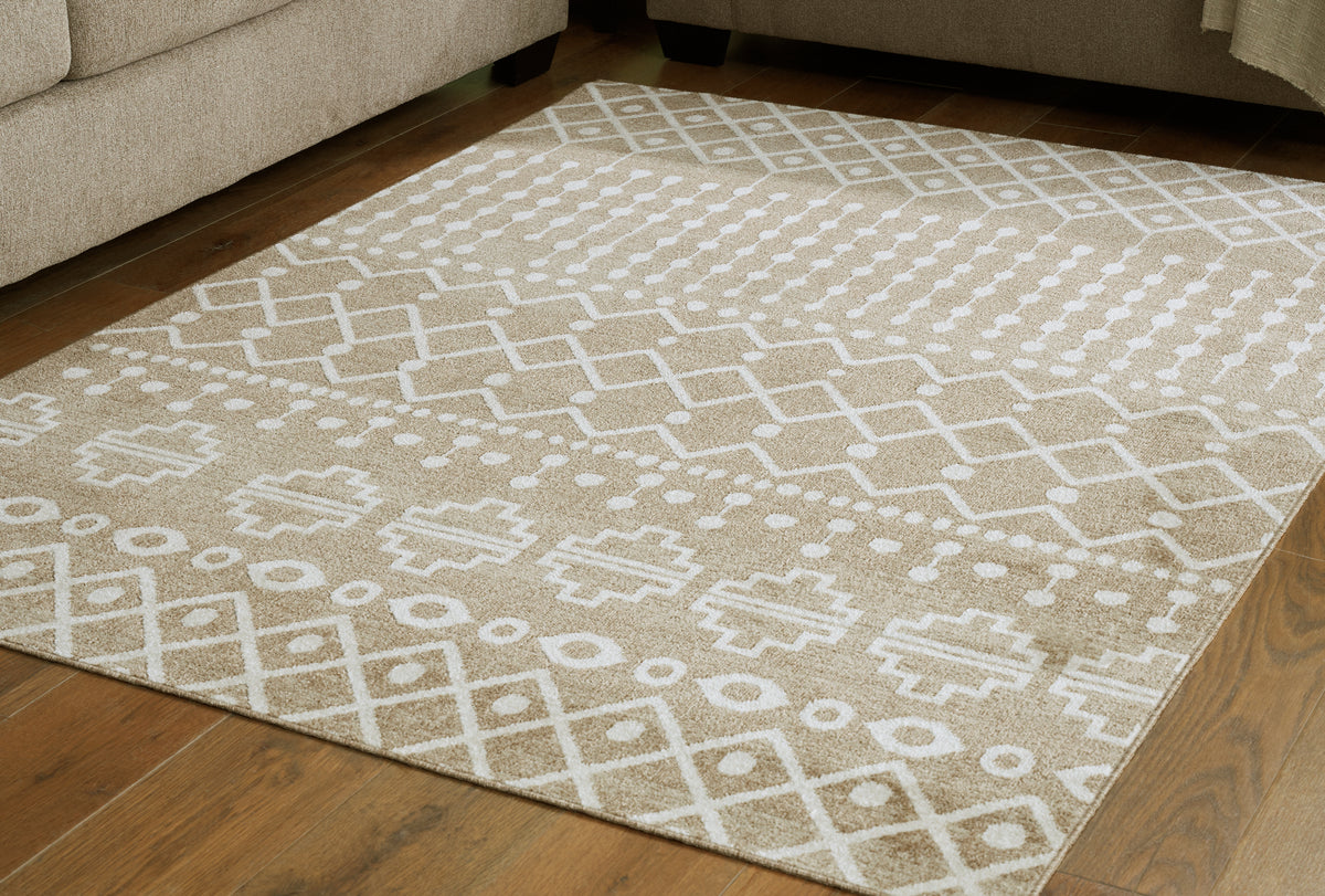 Family Deals Furniture - Ashley Furniture - Bunchly Rug - 7'10" x 10'3" Washable Rug / Tan/Brown/Cream - R406221