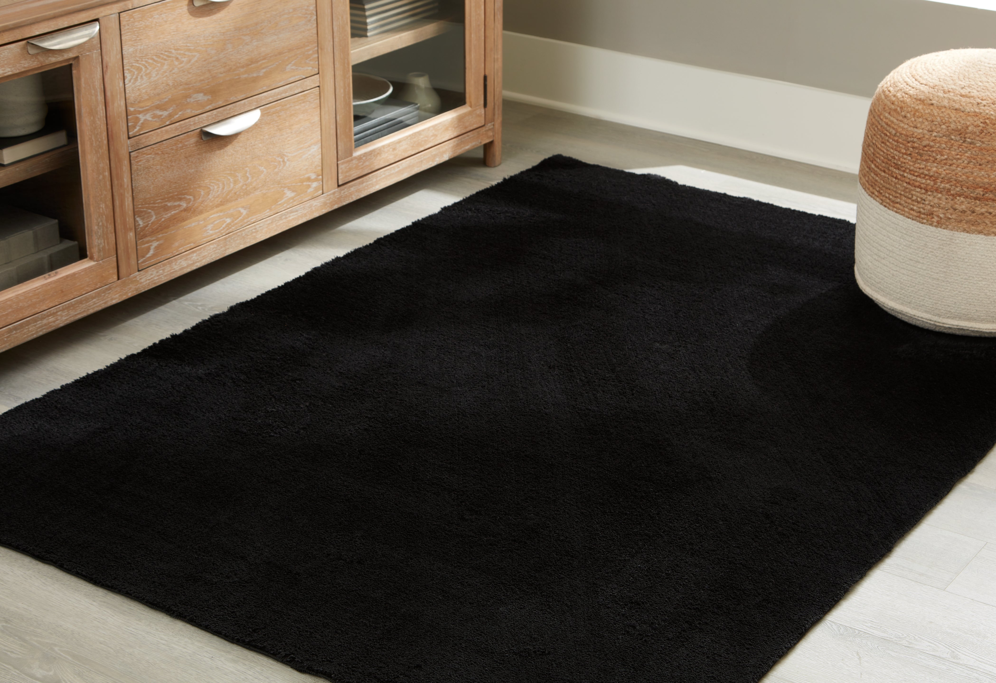 Family Deals Furniture - Ashley Furniture - Anaben Rug - 5' x 7' Washable Rug / Black - R406312