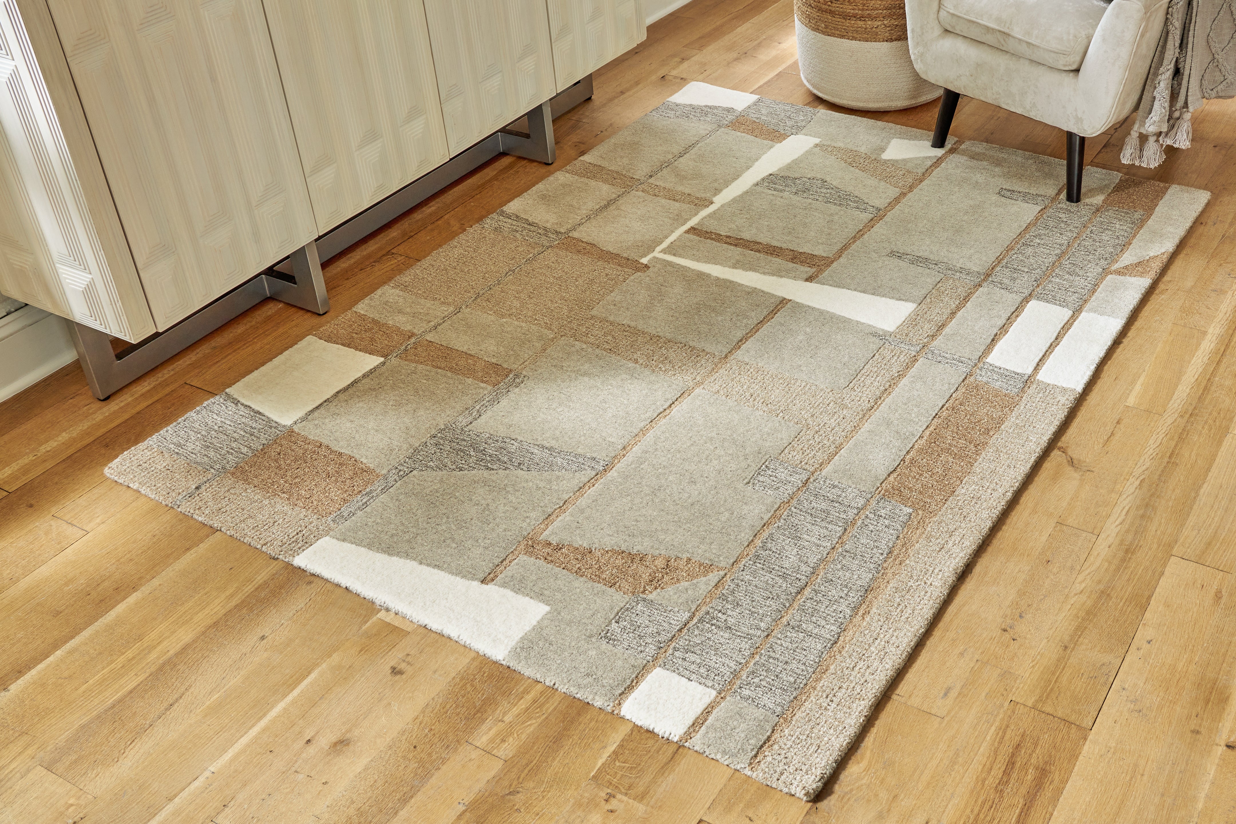 Family Deals Furniture - Ashley Furniture - Abbotton Rug - 5' x 7' Rug / Taupe/Gray/Caramel - R406332