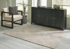 Family Deals Furniture - Ashley Furniture - Jadott Rug - 8' x 10' Rug / Beige/Brown - R406801