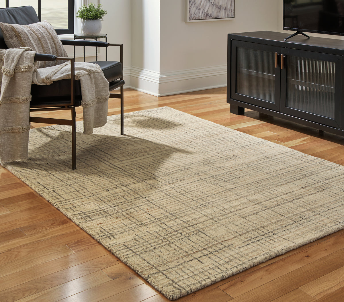 Family Deals Furniture - Ashley Furniture - Janston Rug - 5' x 7' Rug / Ivory/Gray/Tan - R406862