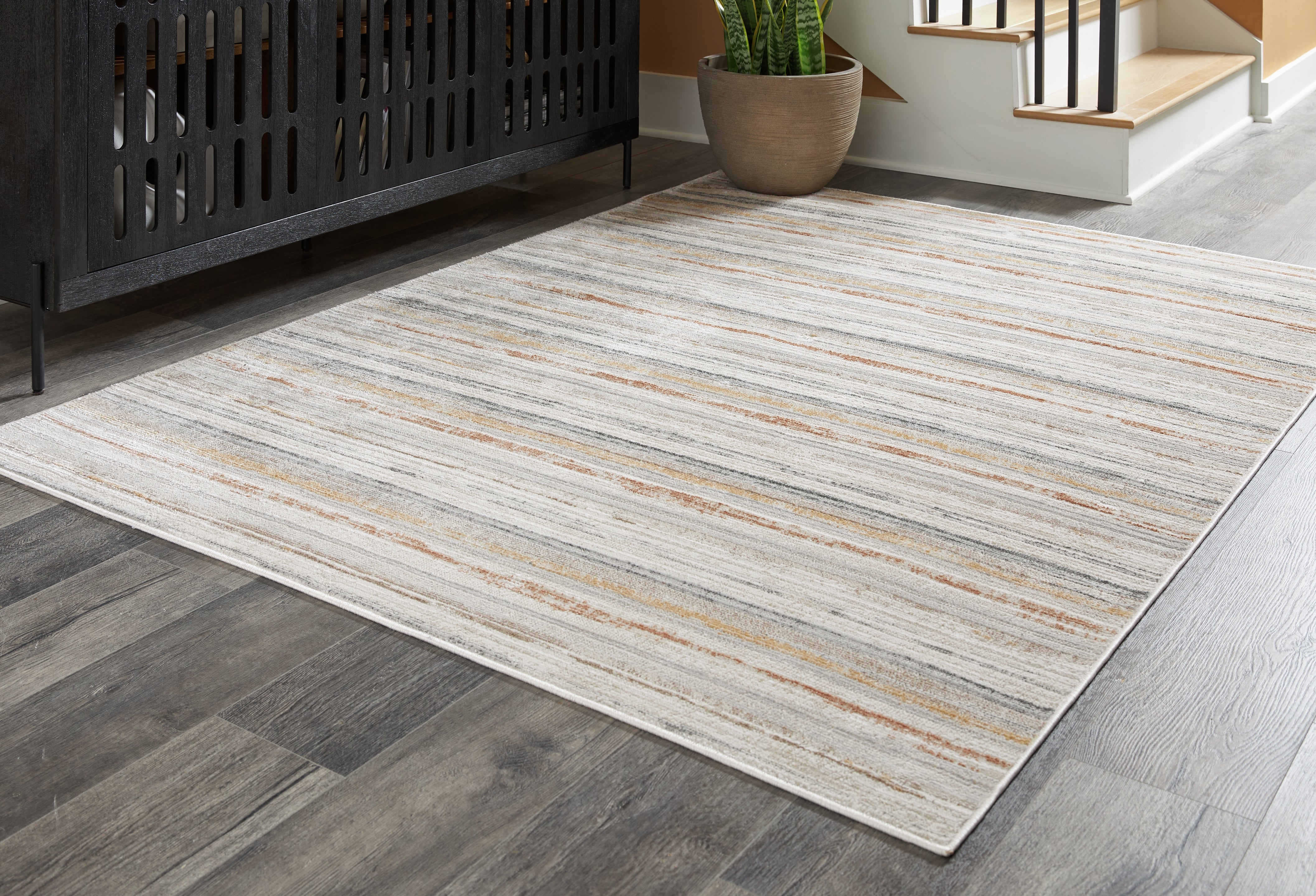 Family Deals Furniture - Ashley Furniture - Artney Rug - 5' x 7' Rug / Multi - R407022