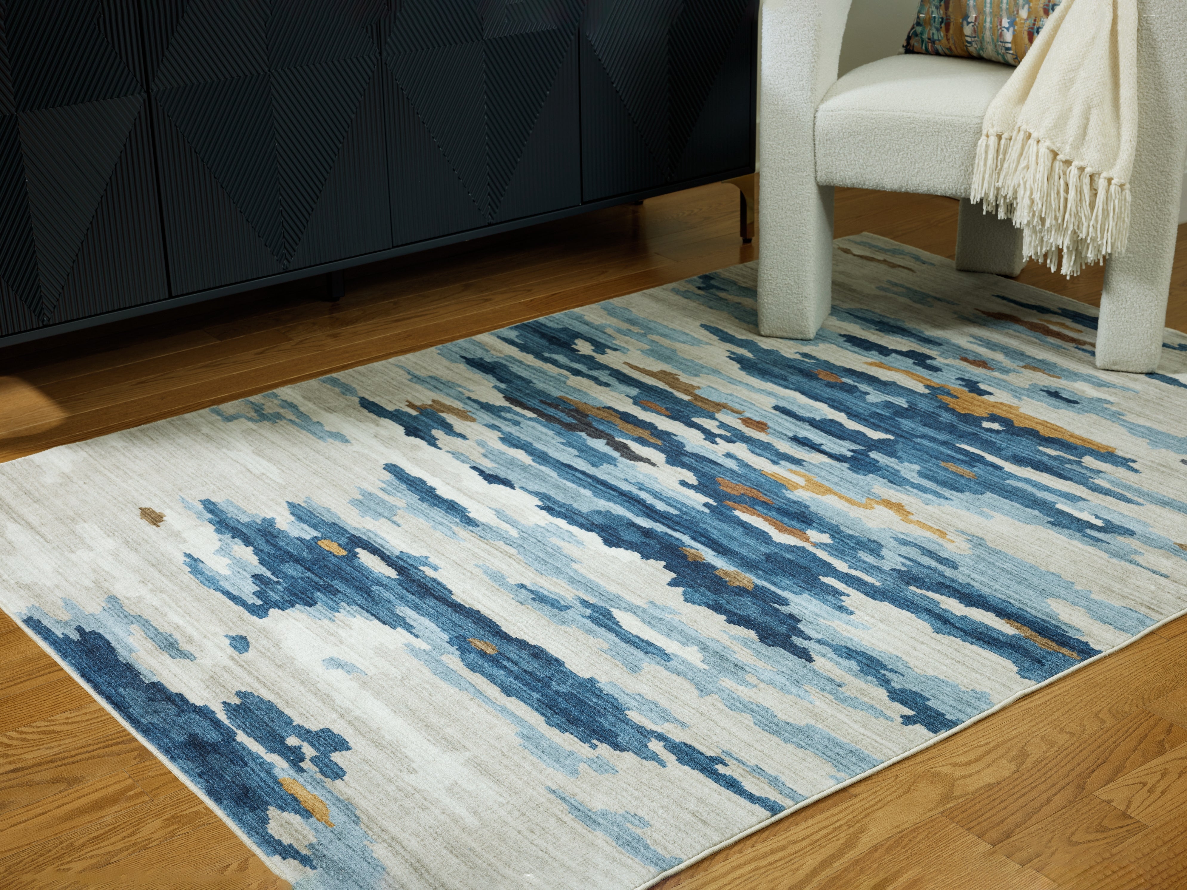 Family Deals Furniture - Ashley Furniture - Vinlett Rug - 5' x 7' Washable Rug / Cream/Blue/Brown - R407042