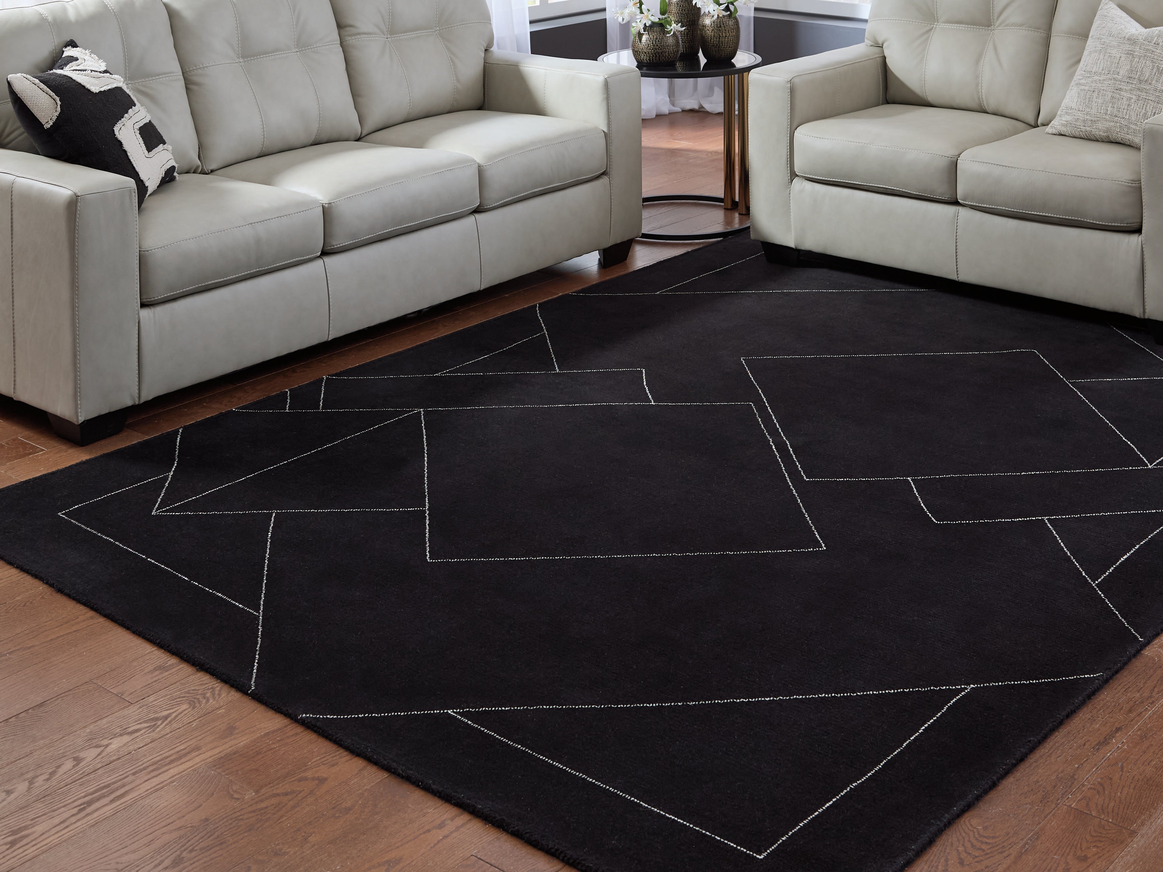 Family Deals Furniture - Ashley Furniture - Marav Rug - 7'8" x 10' Area Rug / Black/White - R407531