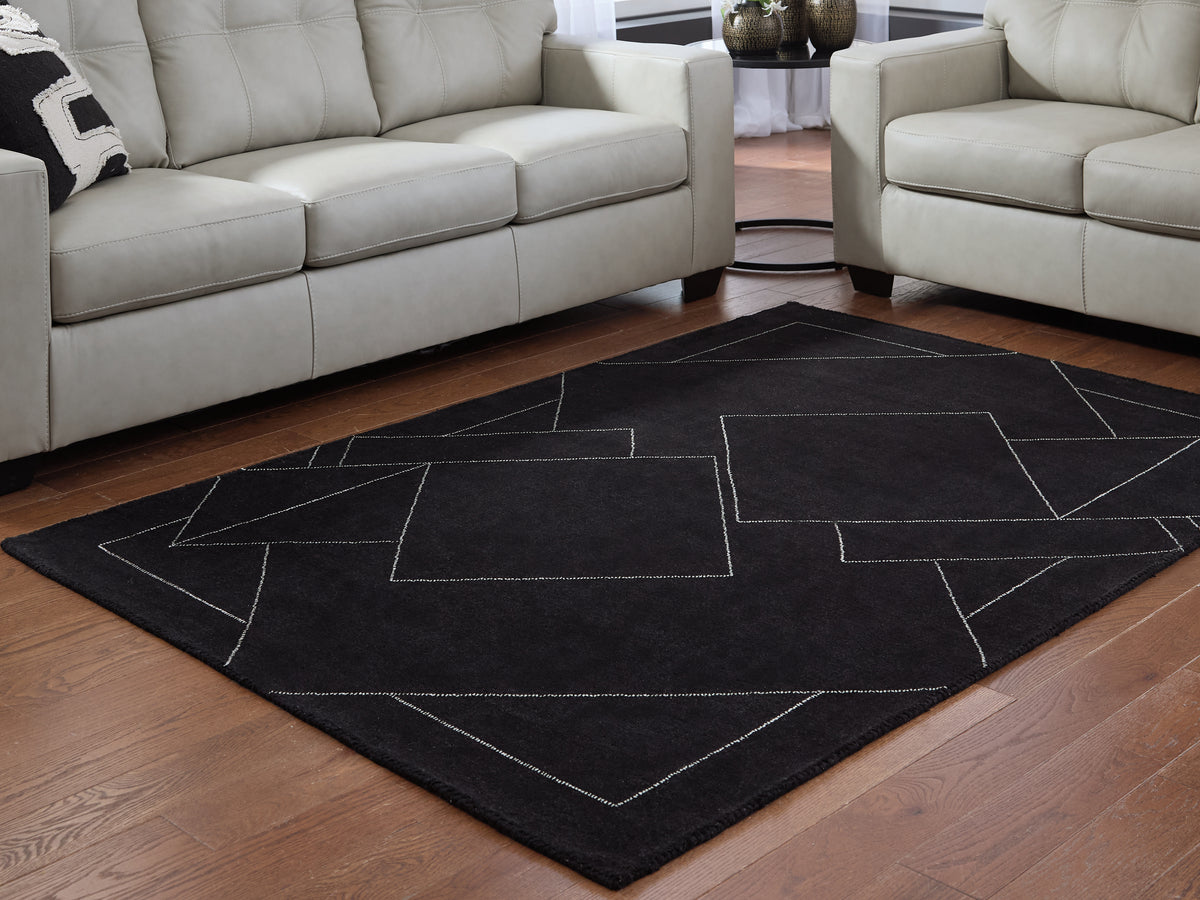 Family Deals Furniture - Ashley Furniture - Marav Rug - 5' x 7' Area Rug / Black/White - R407532
