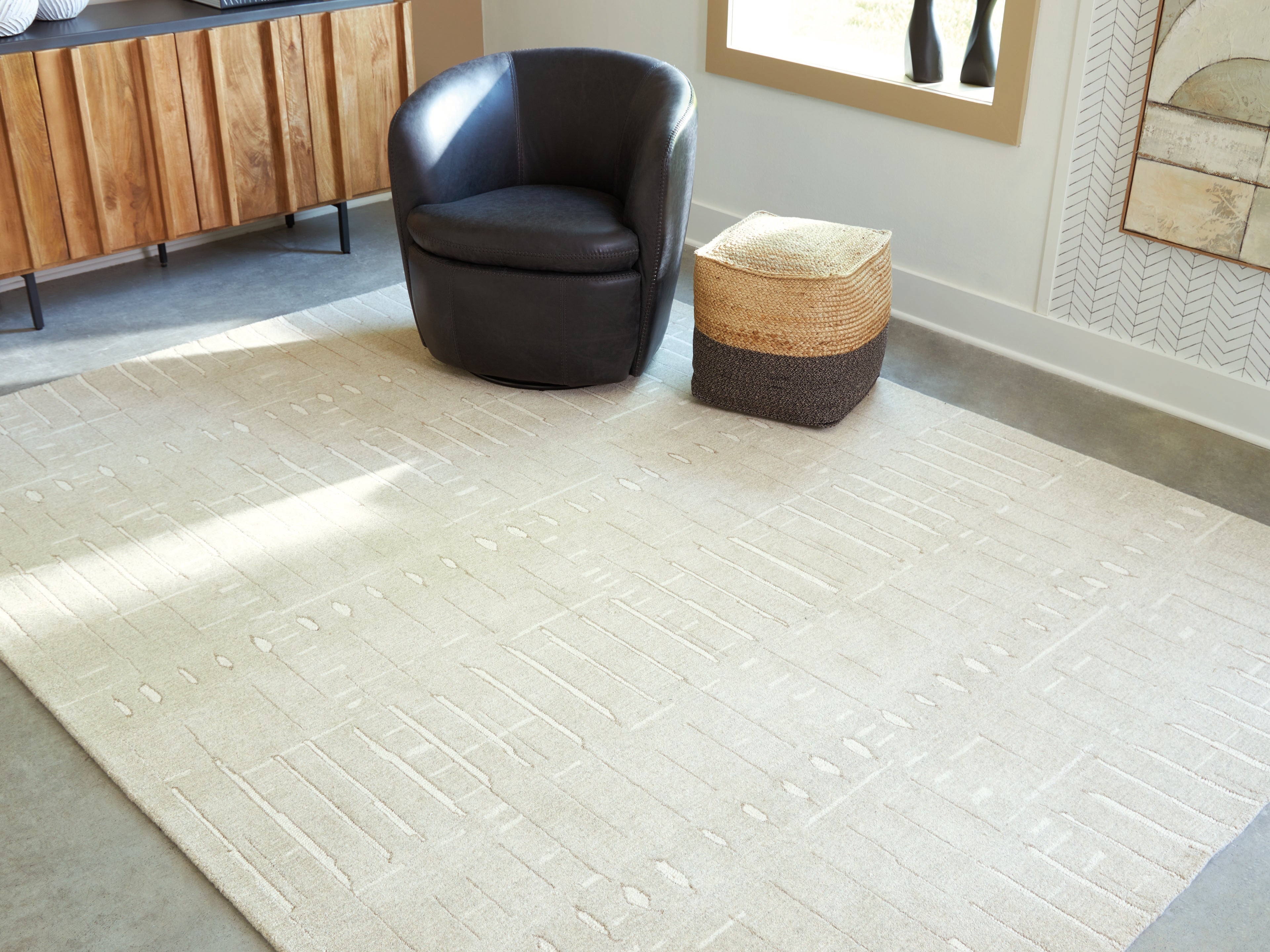 Family Deals Furniture - Ashley Furniture - Wolbert Rug - 7'8" x 10' Area Rug / Tan/Ivory - R407661